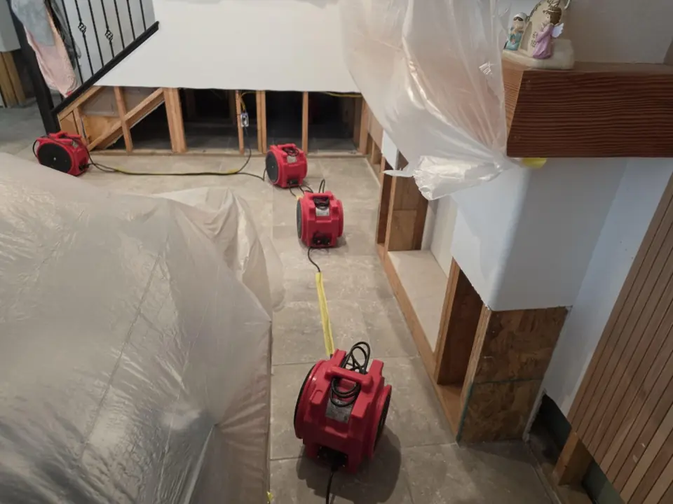 Flood cuts along the drywall with containment and air movers