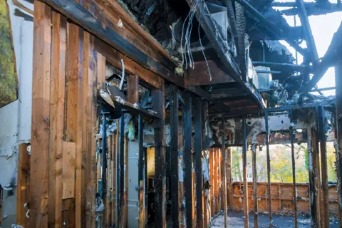 Fire-damaged house interior