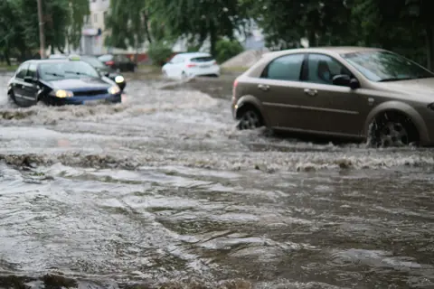 Flash flood water running down a street